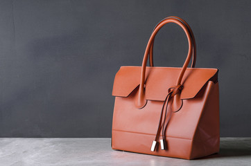 MIK Womanli Brown Pure Leather Handbag: Timeless Sophistication for the Modern Woman